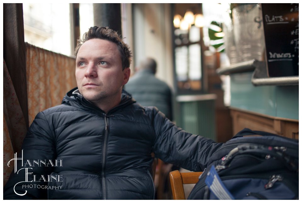 man drinking cafe au lait in le pure cafe in paris france