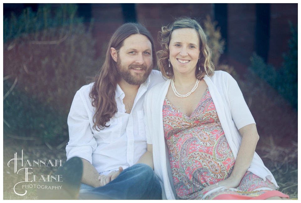 pregnancy photos in front of the large barrel at arrington's entrance