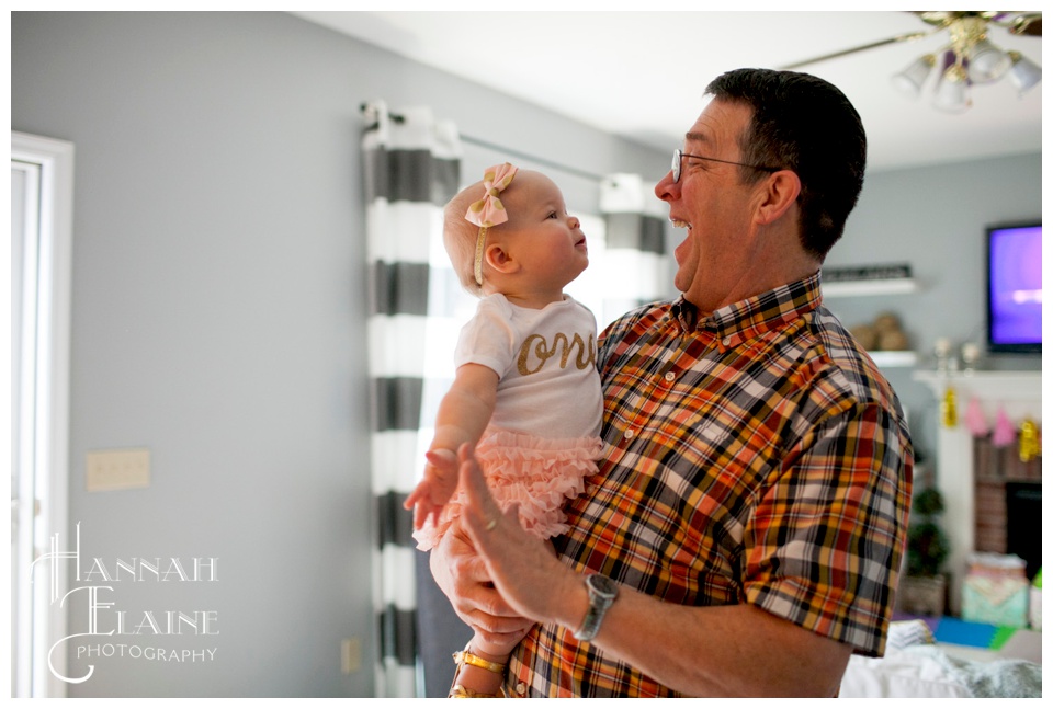 granddaughter shares a giggle with her grandpa