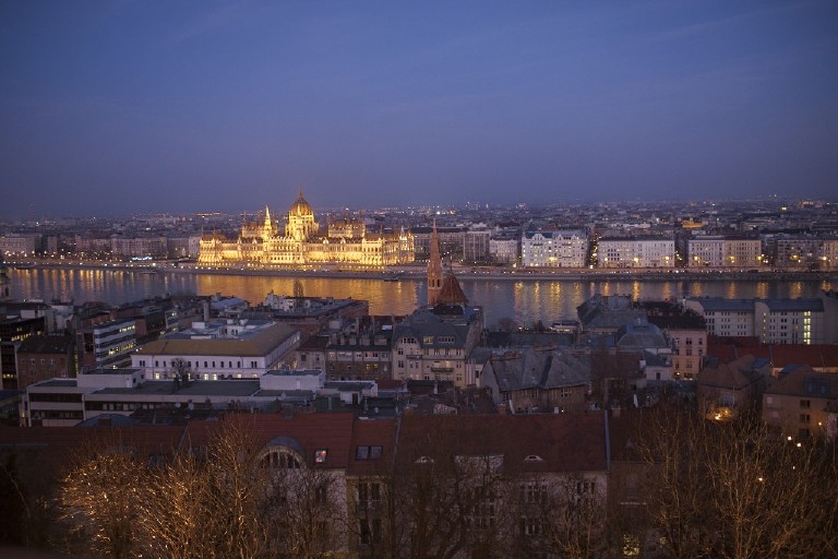 overlooking pest side of river from atop buda hill at dusk