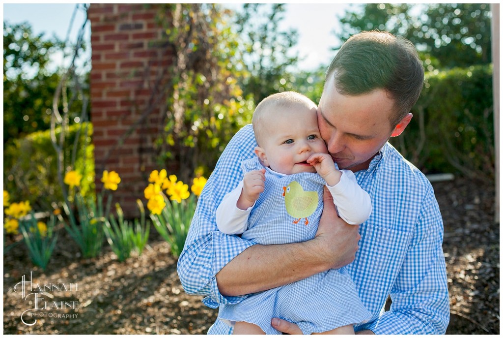 dad and son in the spring daffodils at westhaven