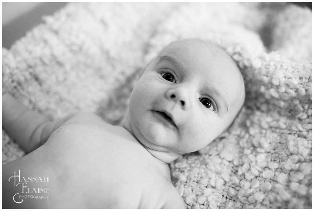 black and white image of a newborn baby's face