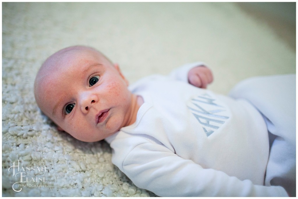 baby in monogrammed onesie