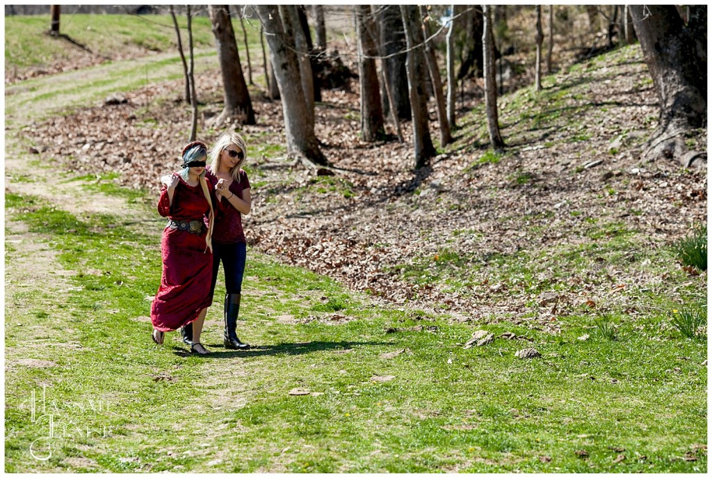 blinded girl in renaissance dress gets led to proposal spot