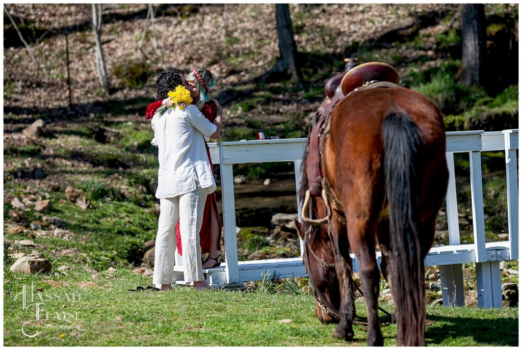 a boy kisses his girlfriend after proposing, she said yes