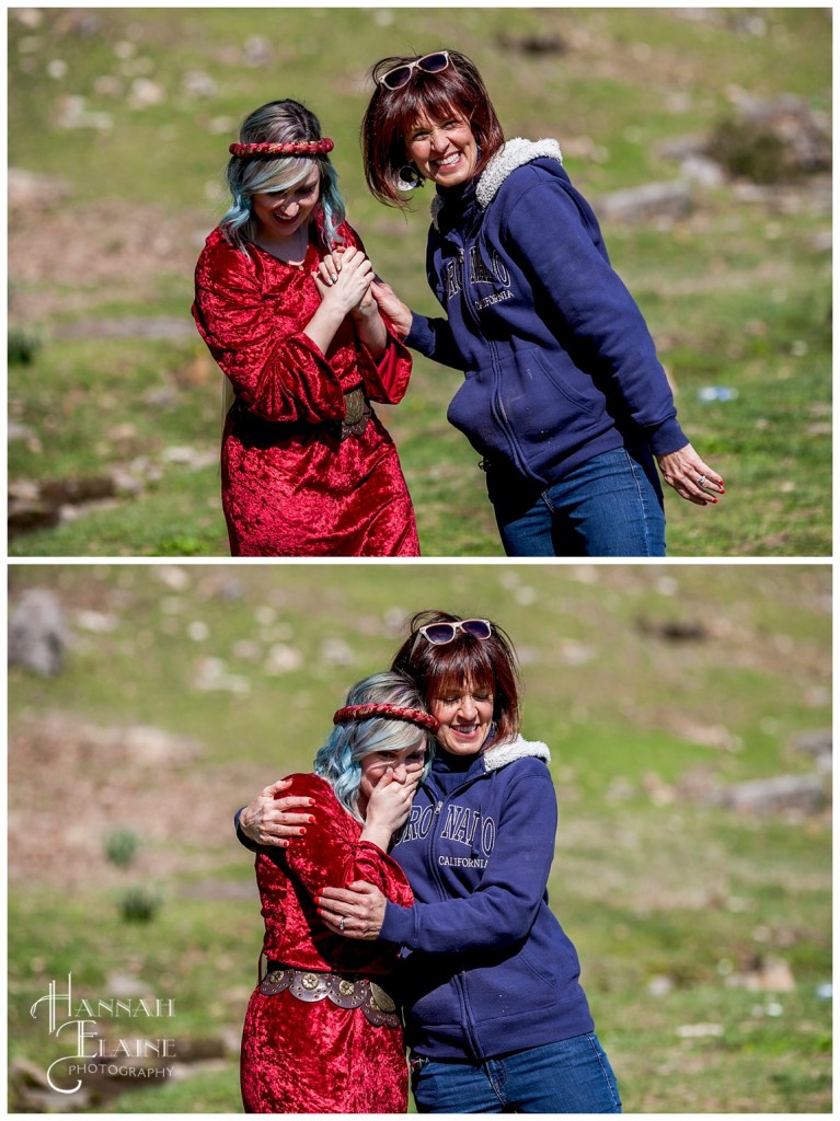 girl in renaissance dress hugs her future mother in law