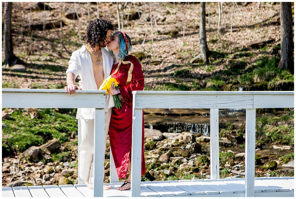 white bridge and waterfall backdrop for renaissance proposal