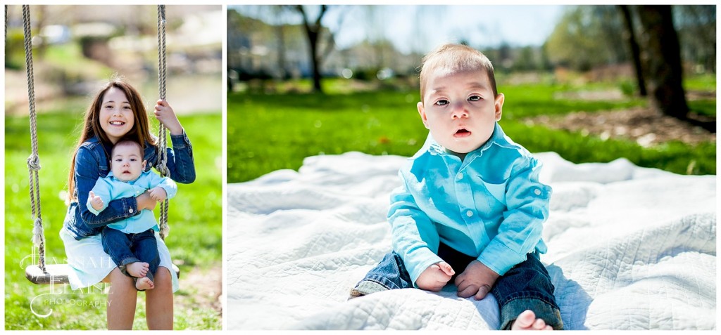 6 month old boy sits on a blanket in the park