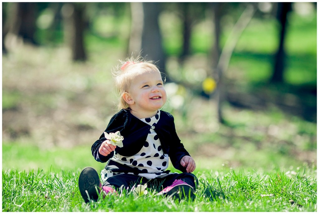 cute spring time photos with daffodils and pink boots