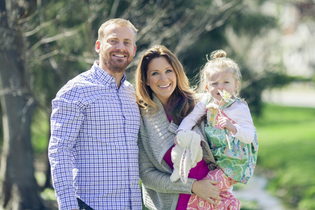 a family poses for family photo at the easter festivities