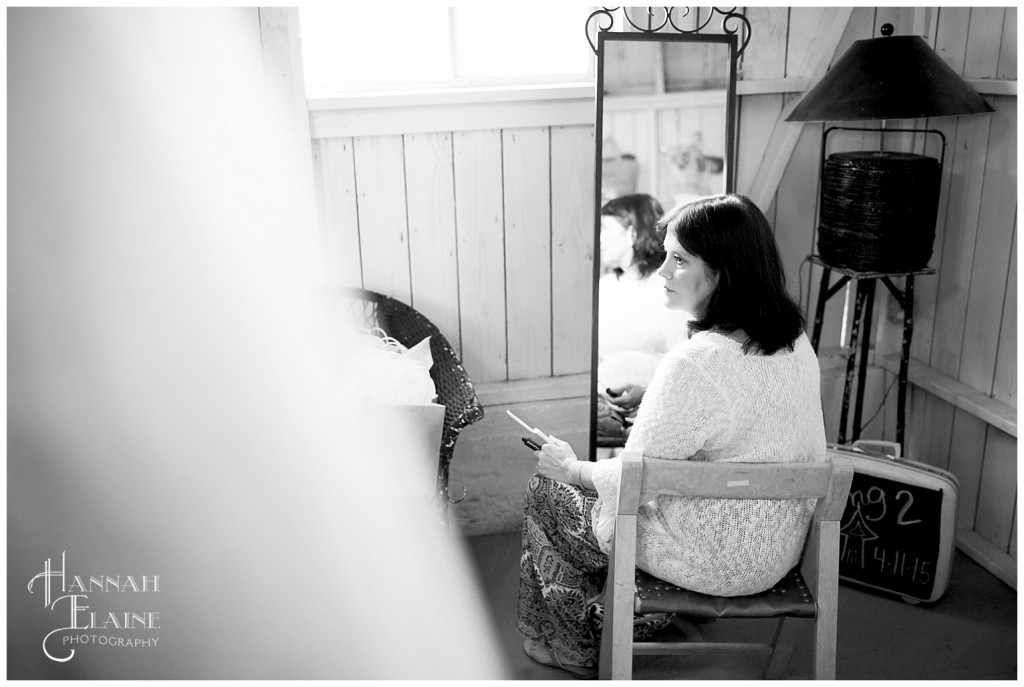 mother of the bride gets ready for the ceremony