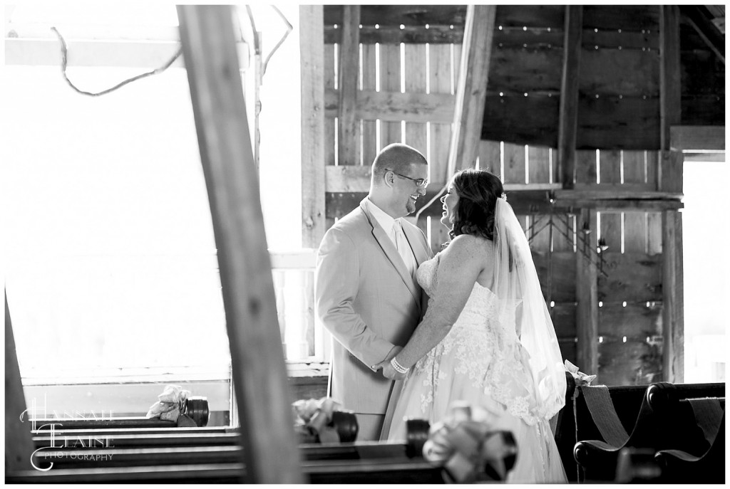 a groom sees his bride for the first time on their wedding day