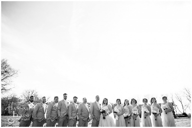 black and white image of the bridal party lined up