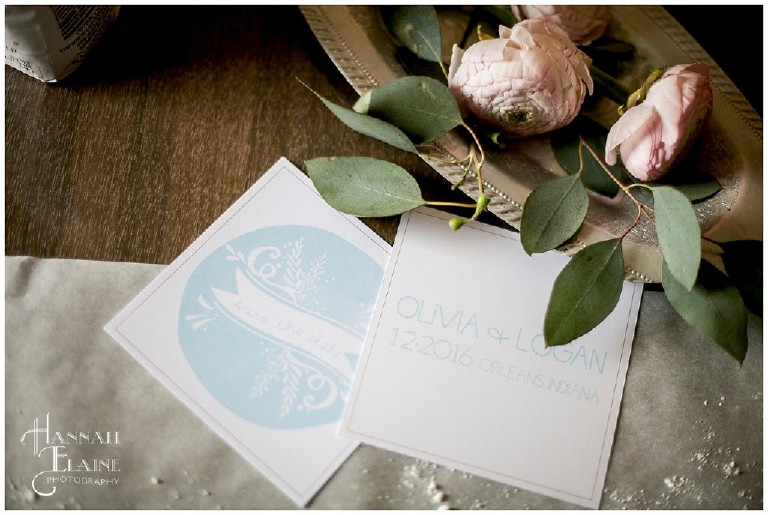 ranunculous and blue save the date cards for olivia and logan custom designed