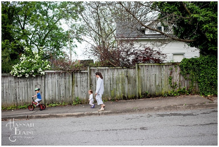 mom walking with her kids in east nashville neighborhood