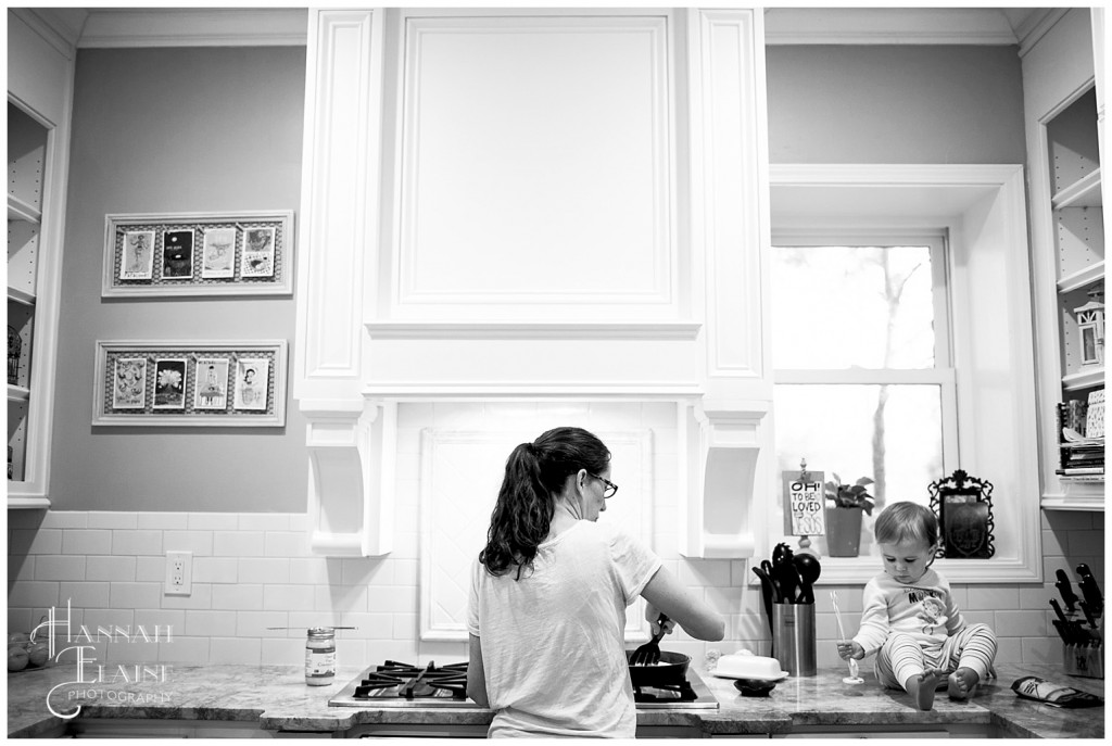 mom and daughter cooking eggs in the kitchen