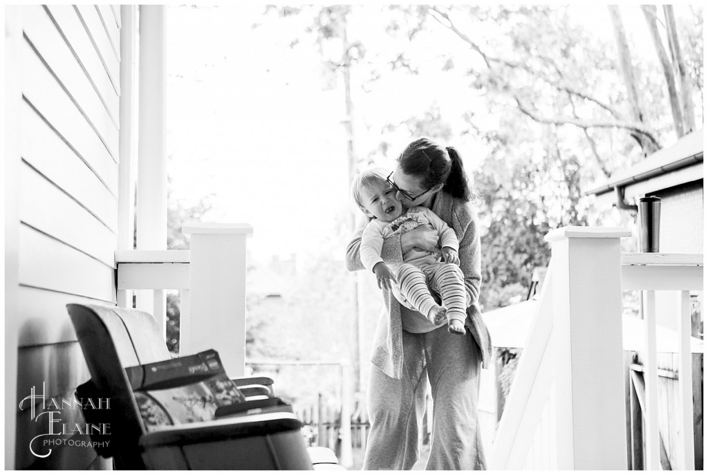 mom comforts her crying baby