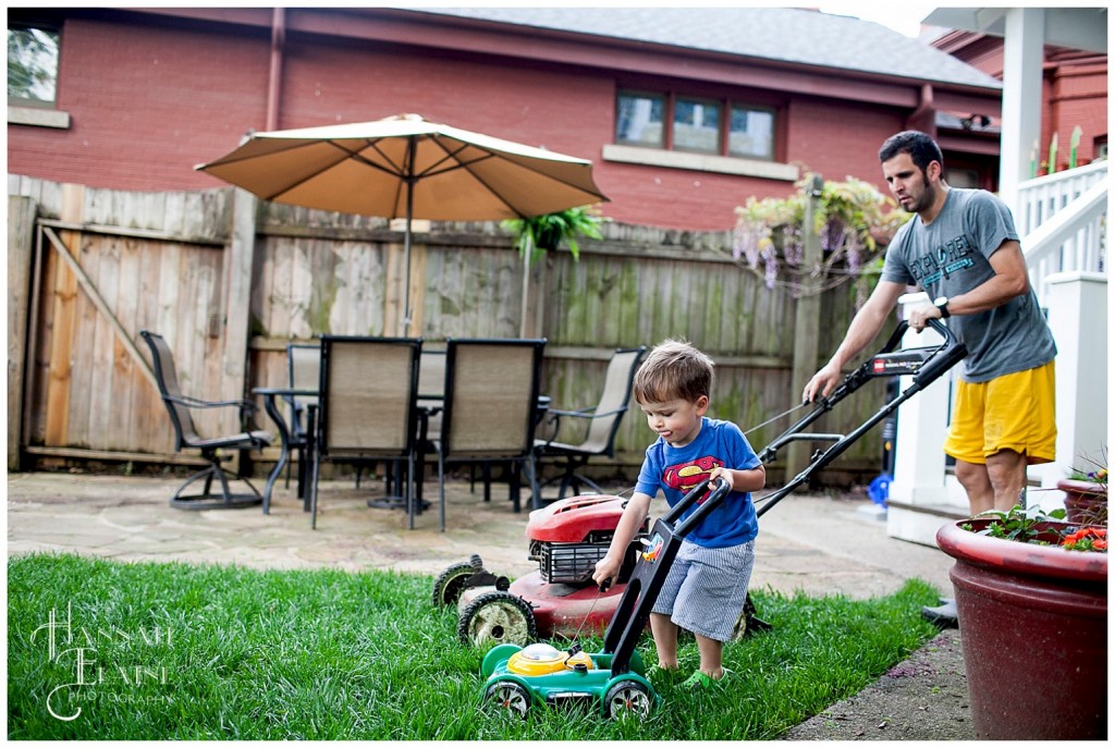 son and dad crank their lawnmowers