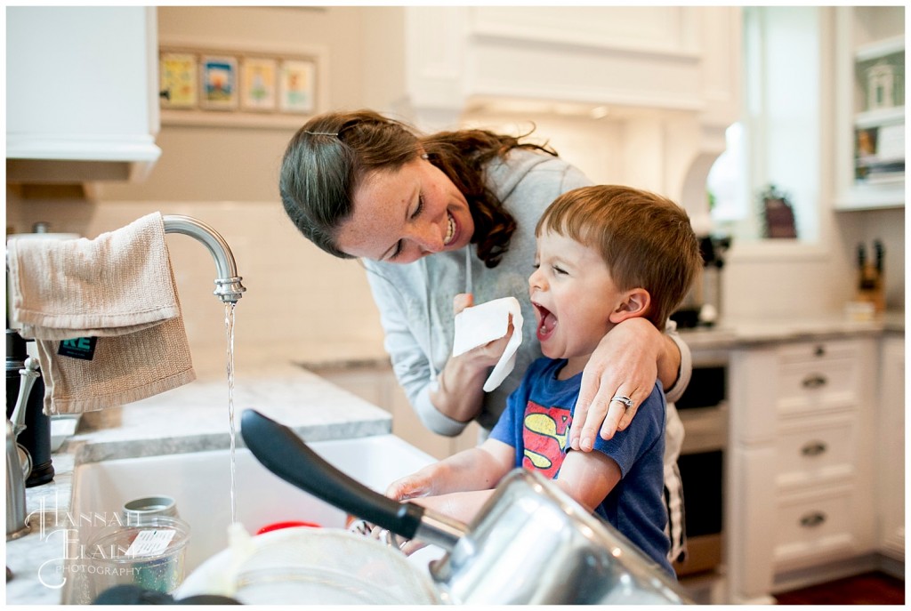 mom wipes ice cream off of son's face