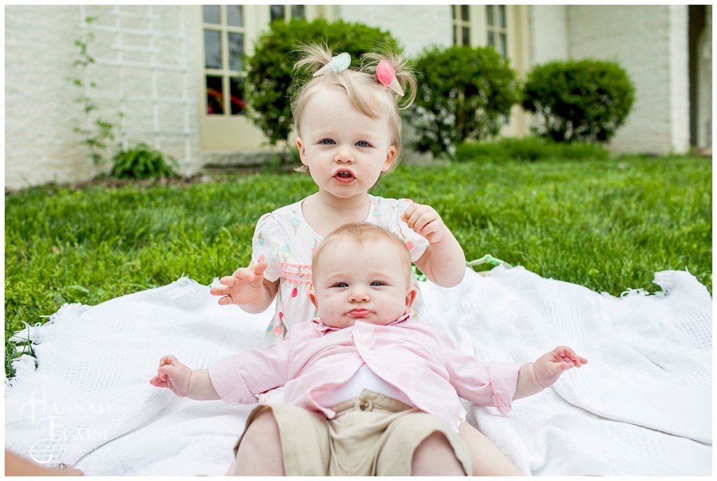 della holds her baby brother ethan