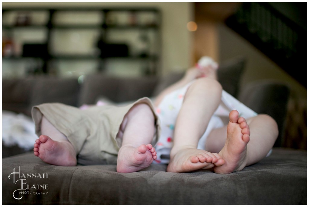 closeup of the feet of two kids