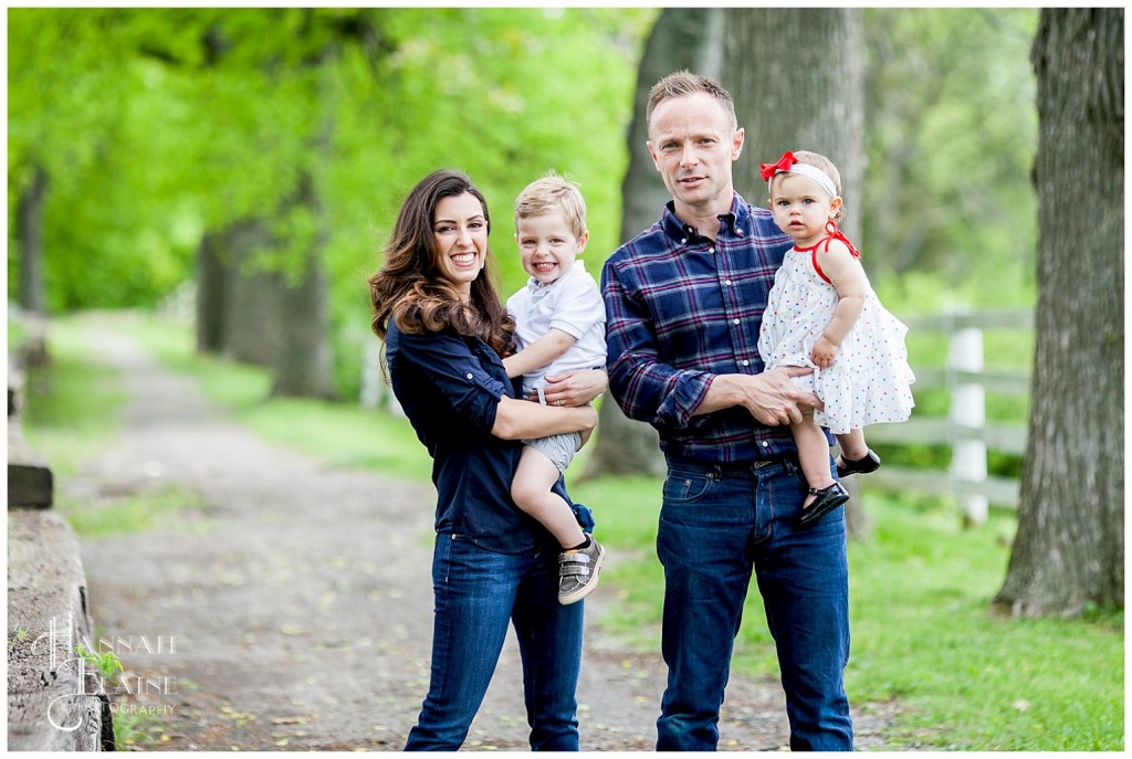 beautiful family portraits on the walking path in the park