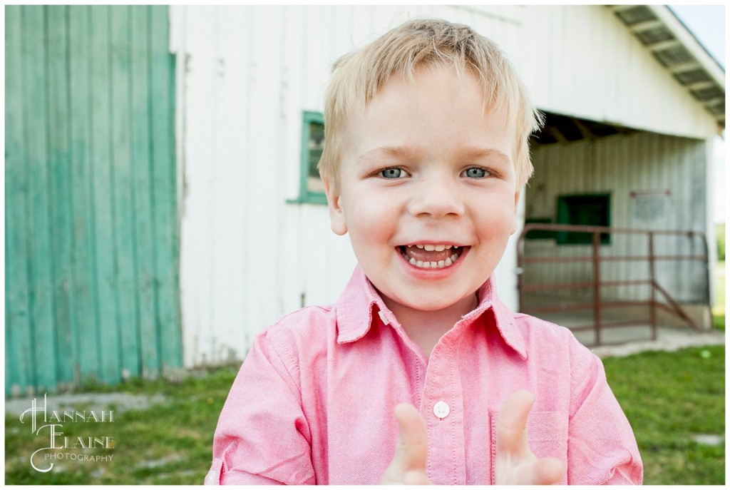 parker cheeses for the camera at the barn