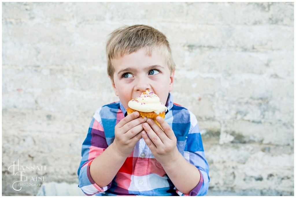 peyton eats his enormous whole foods cupcake