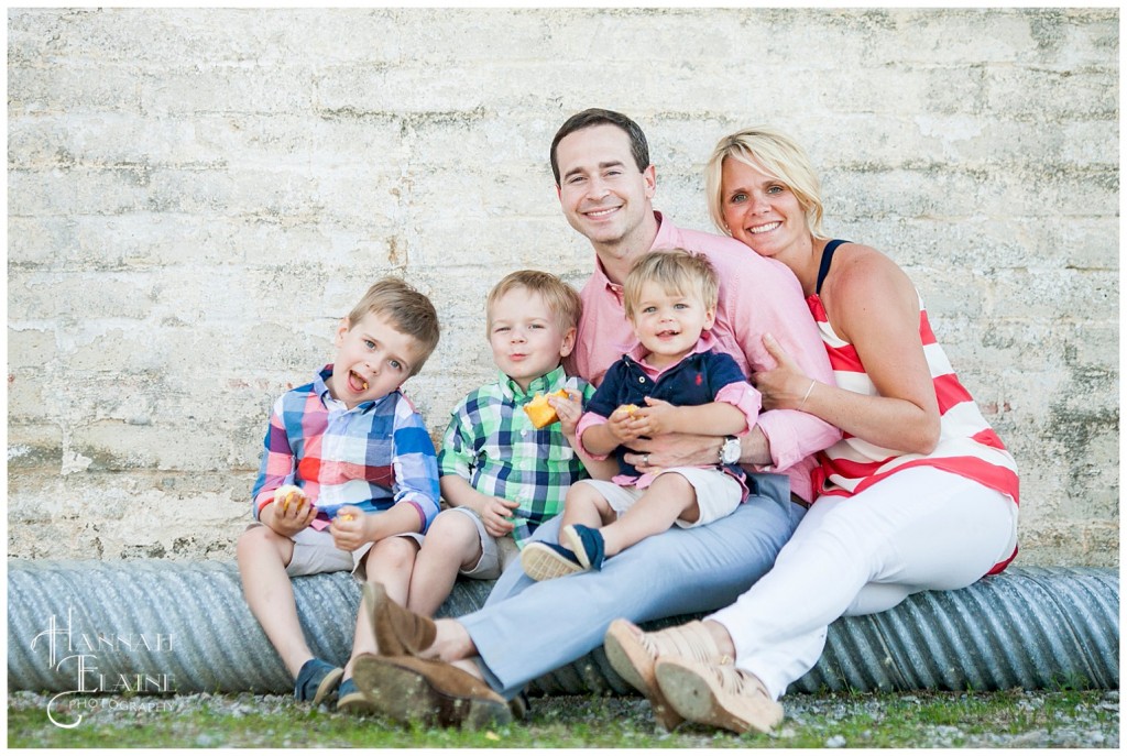 family takes a break from cupcakes to take a family photo