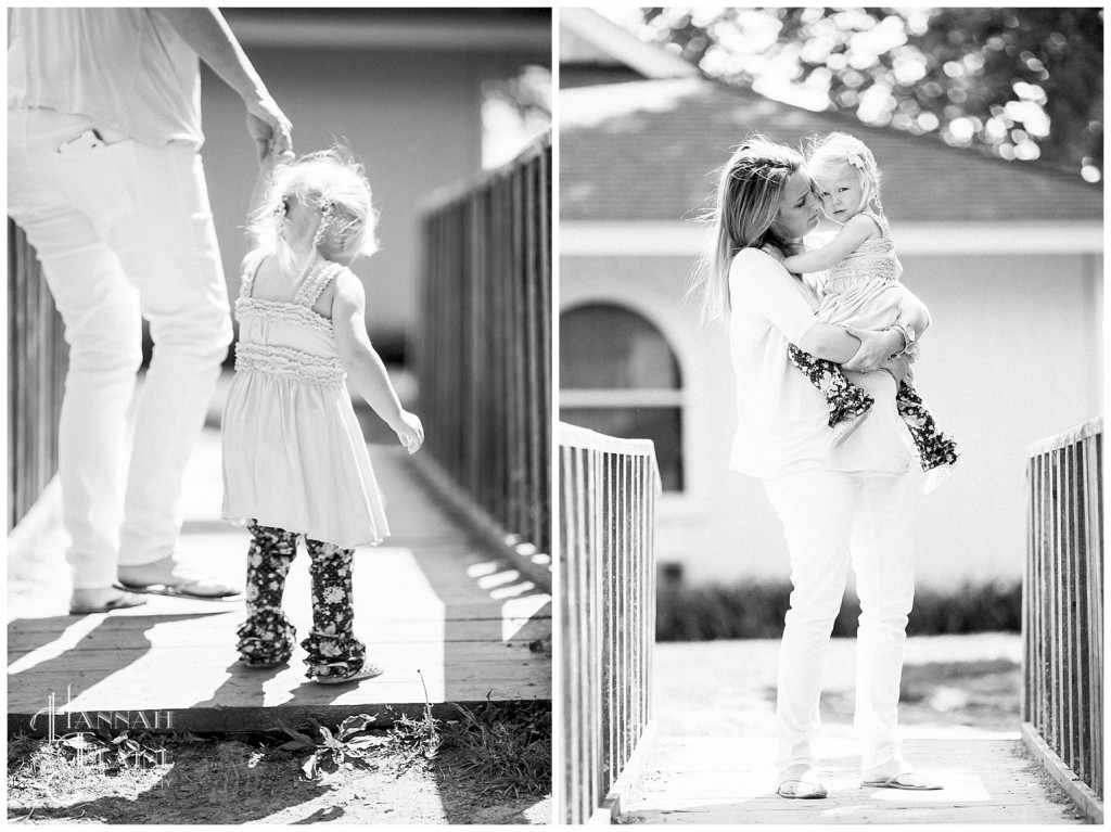 little girl is not a fan of walking on the small bridge