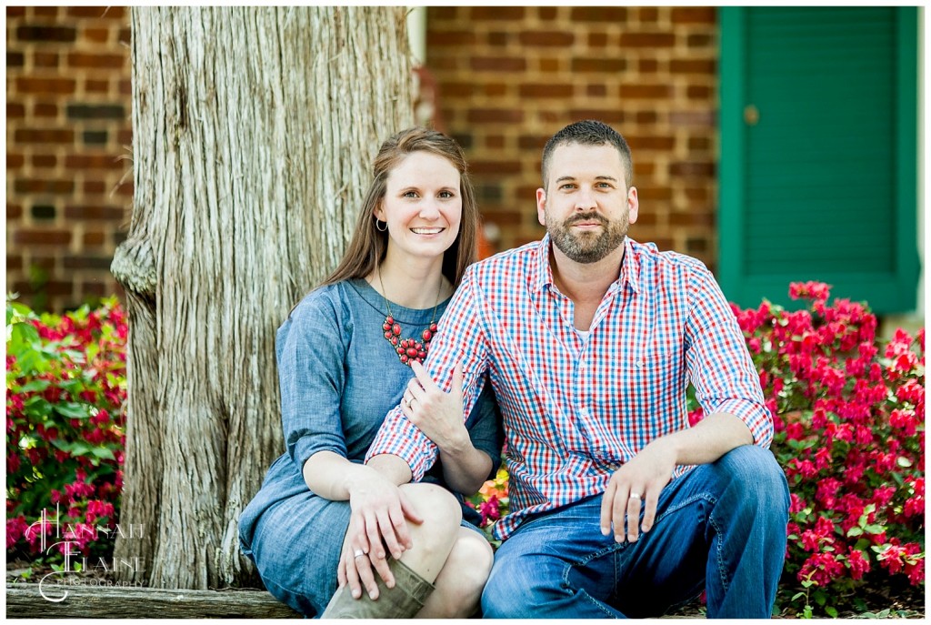 couple takes a portrait together in the garden