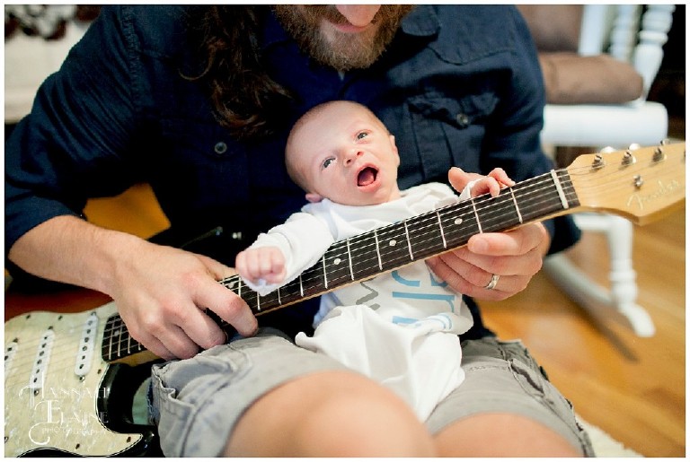 baby plays electric guitar