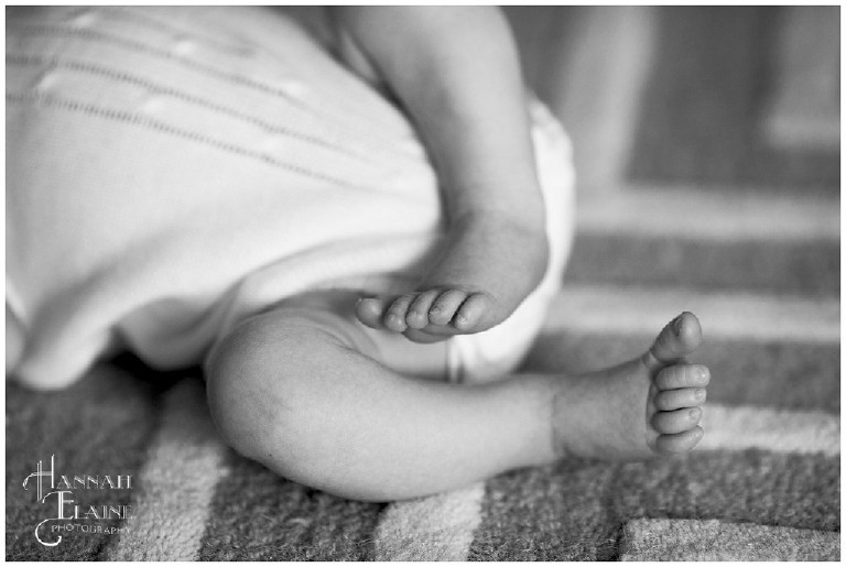 black and white image of baby feet