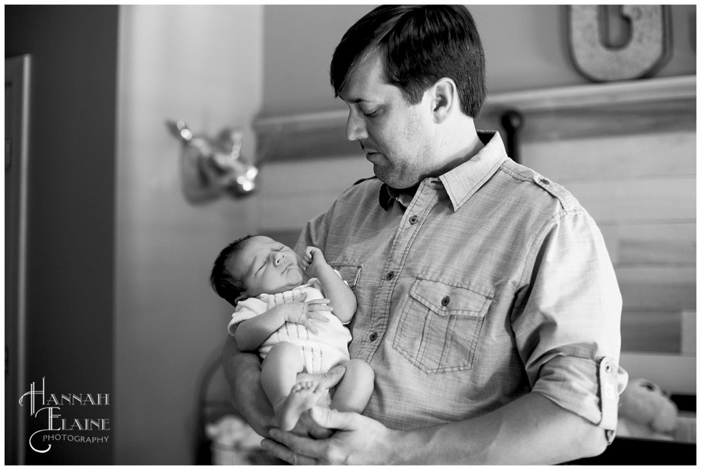 sleeping baby boy in daddy's arms