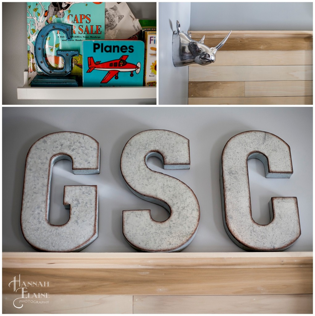 book shelf, monogram letters and a rhino head nursery decor