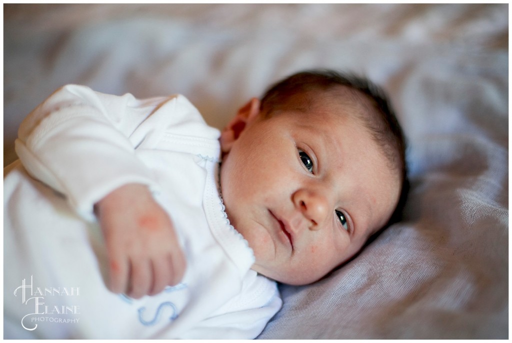 baby opens his eyes for a photo