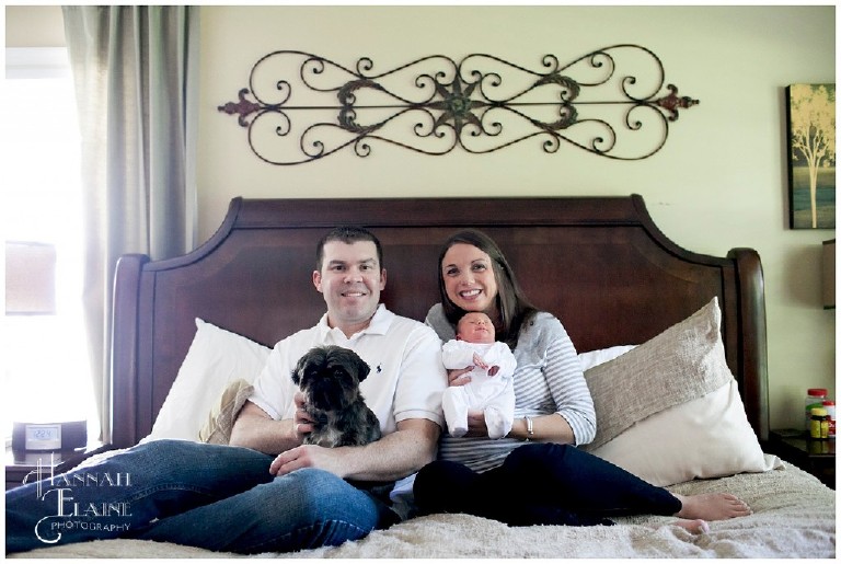 family photo on the bed with the dog