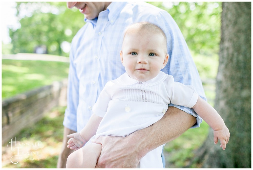 close up of boy in his daddy's arms