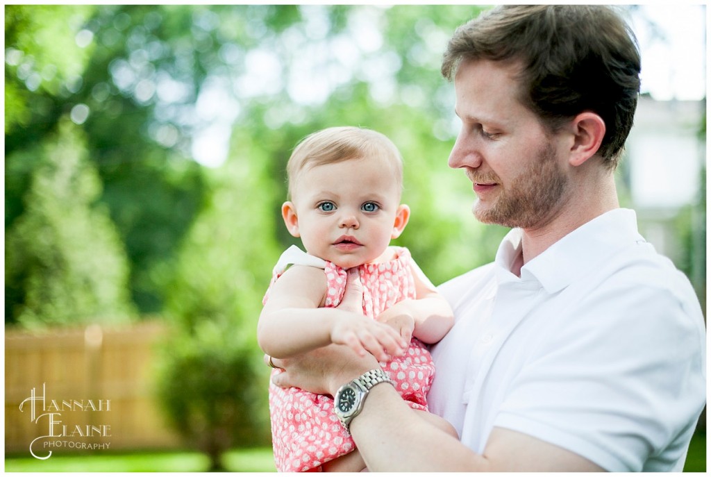 dad holds his daughter