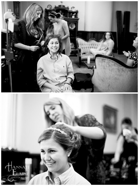 bride gets her hair done in the parlor