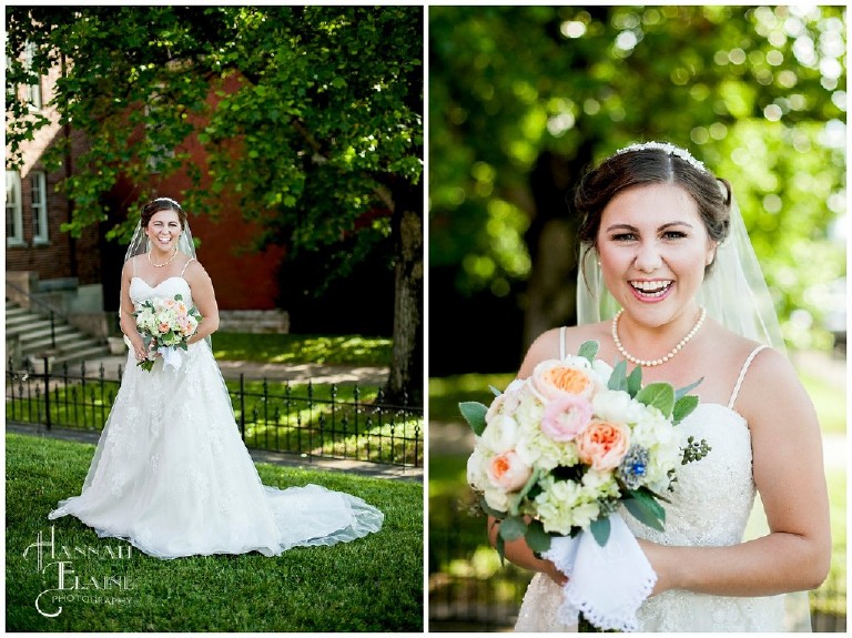 bride with peach tone bouquet laughs in the park