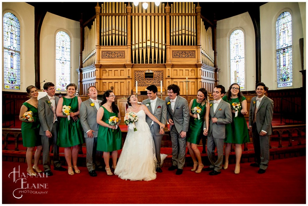 bridal party takes a silly photo