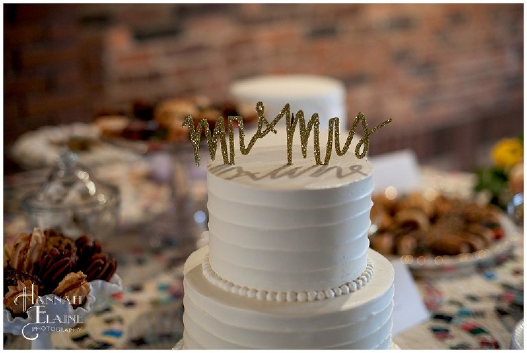 sparkly gold "Mr and Mrs" cursive white cake topper
