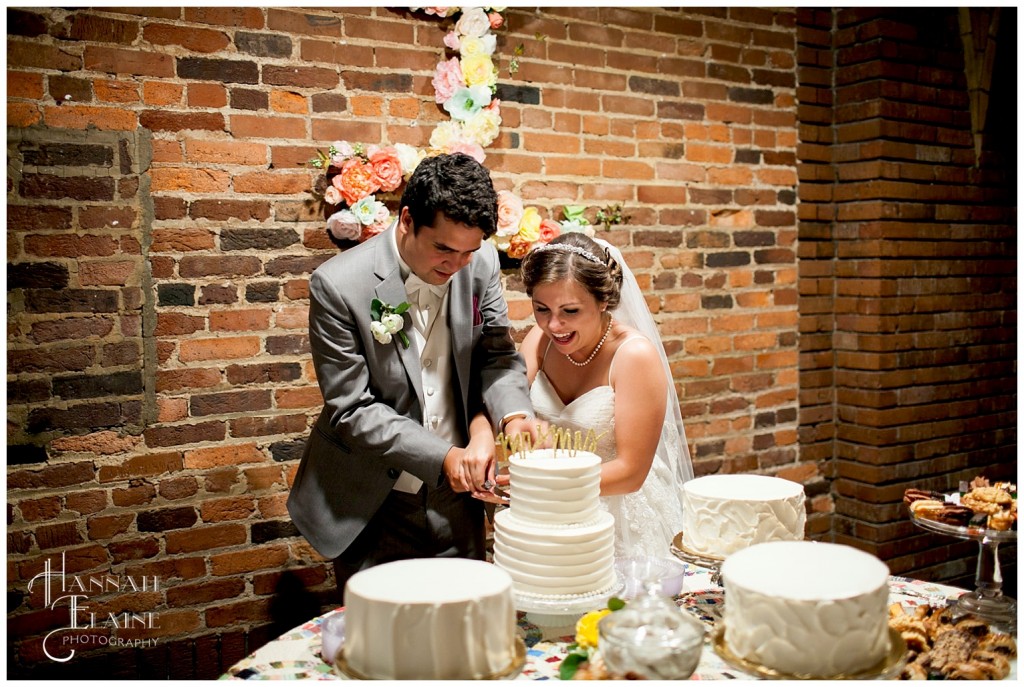 cake cutting ceremony at warehouse reception building