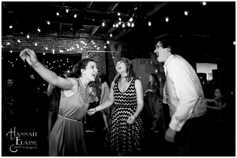wedding guests sing and dance