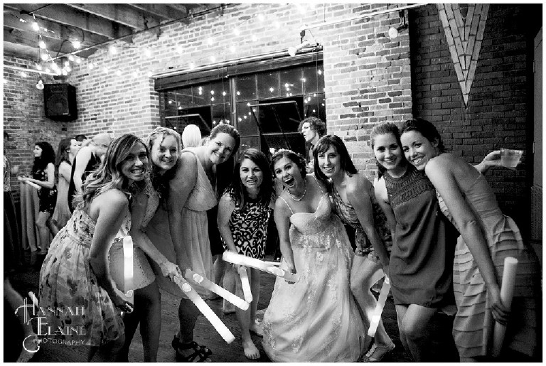 the bride and all her girls together on the dance floor