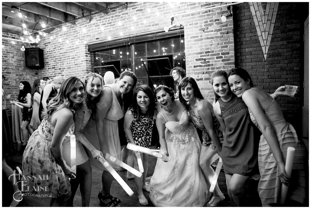 the bride and all her girls together on the dance floor