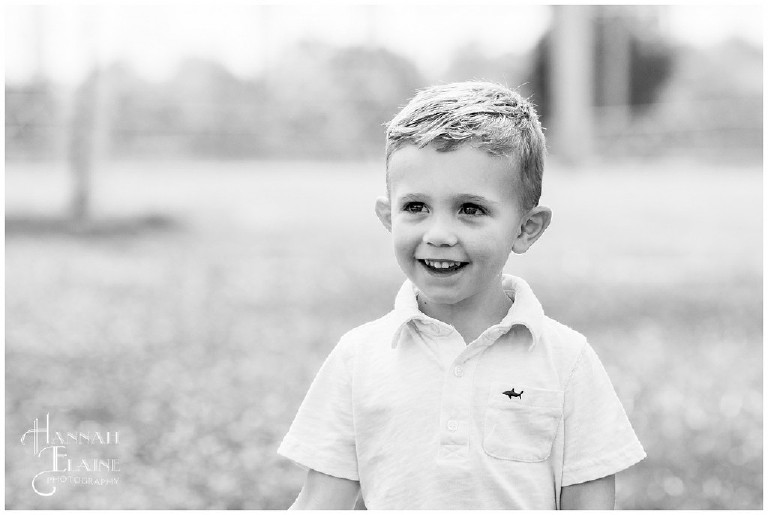 black and white photo of cute little boy