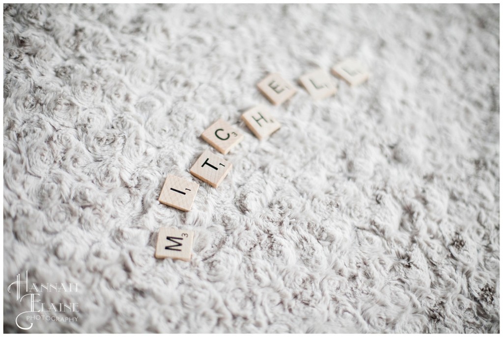 scrabble letters spelling out the new baby's name, mitchelll