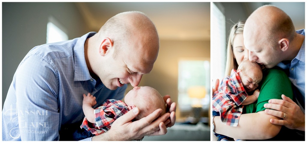 dad cuddles his newborn son